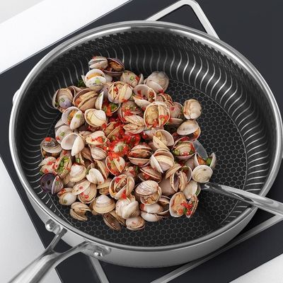 Una maniglia in acciaio inossidabile 3 strati Padella antiaderente a nido di miele per utensili da cucina durevoli