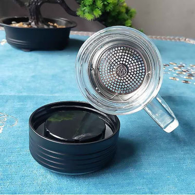 Tazza d'acqua isolante in vetro trasparente in stile classico con maniglie e compartimenti da tè