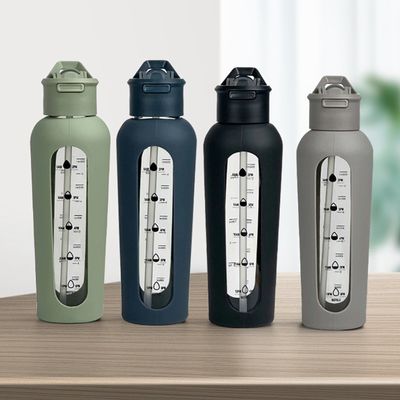 700 ml/1000 ml bottiglie portatili di vetro con logo personalizzato con maniche in silicone e timbre