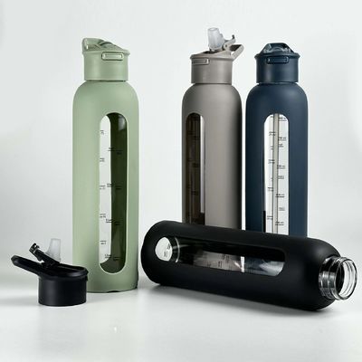 Logo personalizzato Accettabile Bottiglia di vetro portatile da 700 ml/1000 ml con timbre