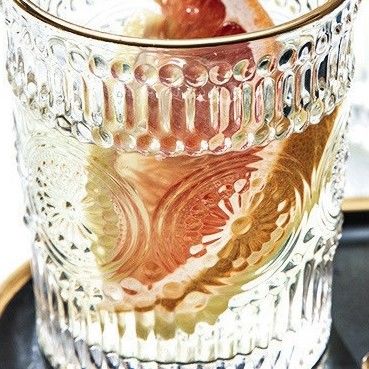 Tazza di vetro con bordo d'oro con design a girasole e stile classico