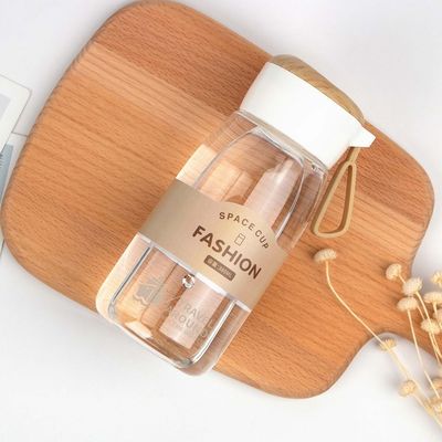 Logo personalizzato Accettabile Bottiglia di plastica trasparente da 380 ml con coperchio e maniglia