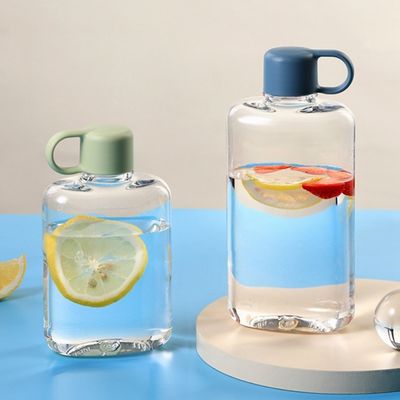 Bottiglia d'acqua chiara per esterni Tritan portatile Mini Tazza d'acqua di plastica per la resistenza alle gocce